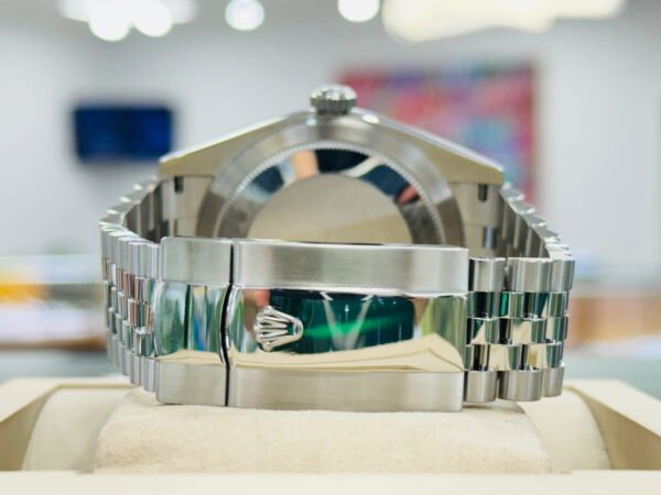 The Rolex Sky-Dweller 42mm (model 326934) with a White Index dial and Jubilee bracelet watch.